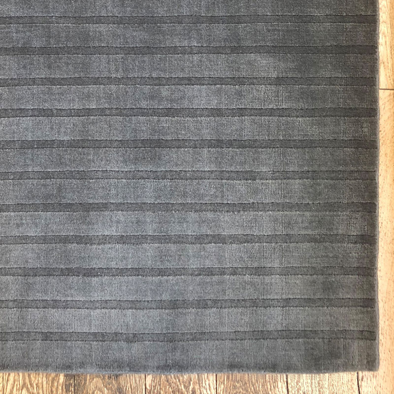 carved charcoal rug